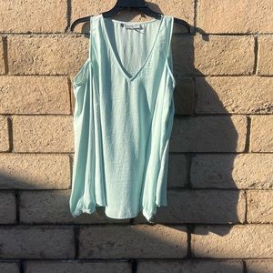 Light mint green open sleeved Jennifer Lopez top
